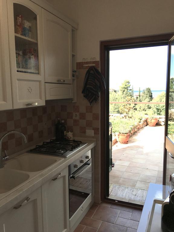 Апартаменти Casa Azzurra Порто-Санто-Стефано Екстер'єр фото