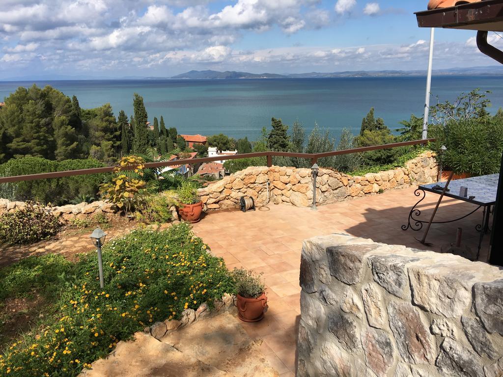 Апартаменти Casa Azzurra Порто-Санто-Стефано Екстер'єр фото